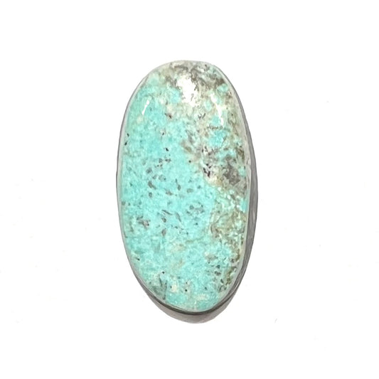 A light blue Valley Blue turquoise stone from Lander County, Nevada.  The stone is an oval cabochon cut.