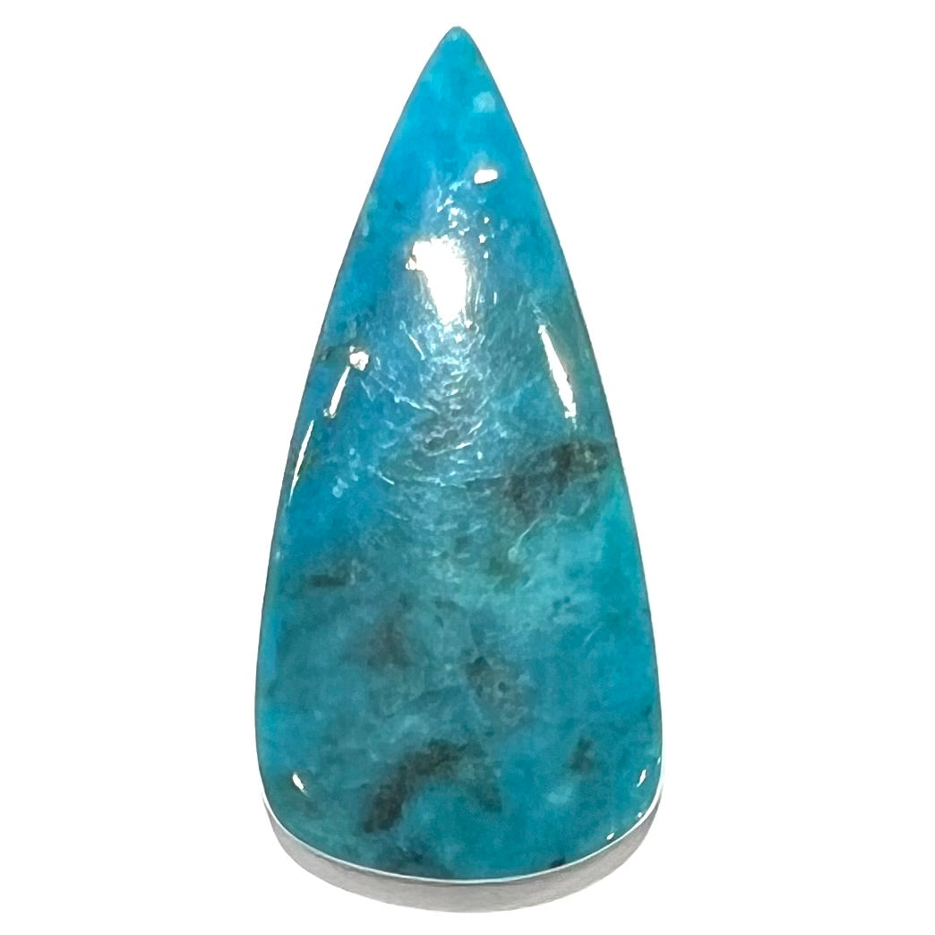A loose, pear shaped turquoise stone from the Courtland-Gleeson mining district of Arizona.