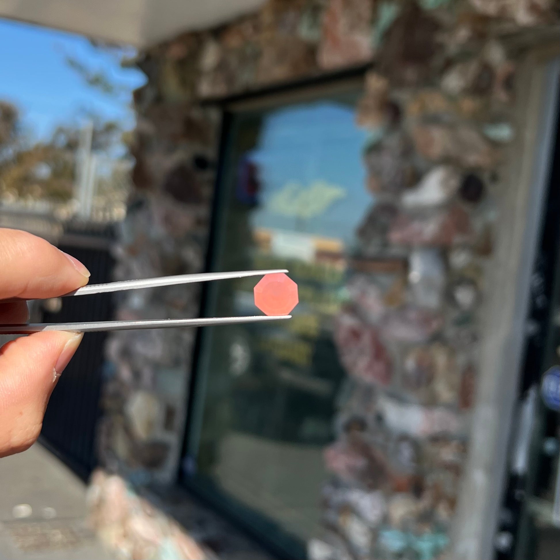 A faceted, octagon cut pink fire opal from Mexico.