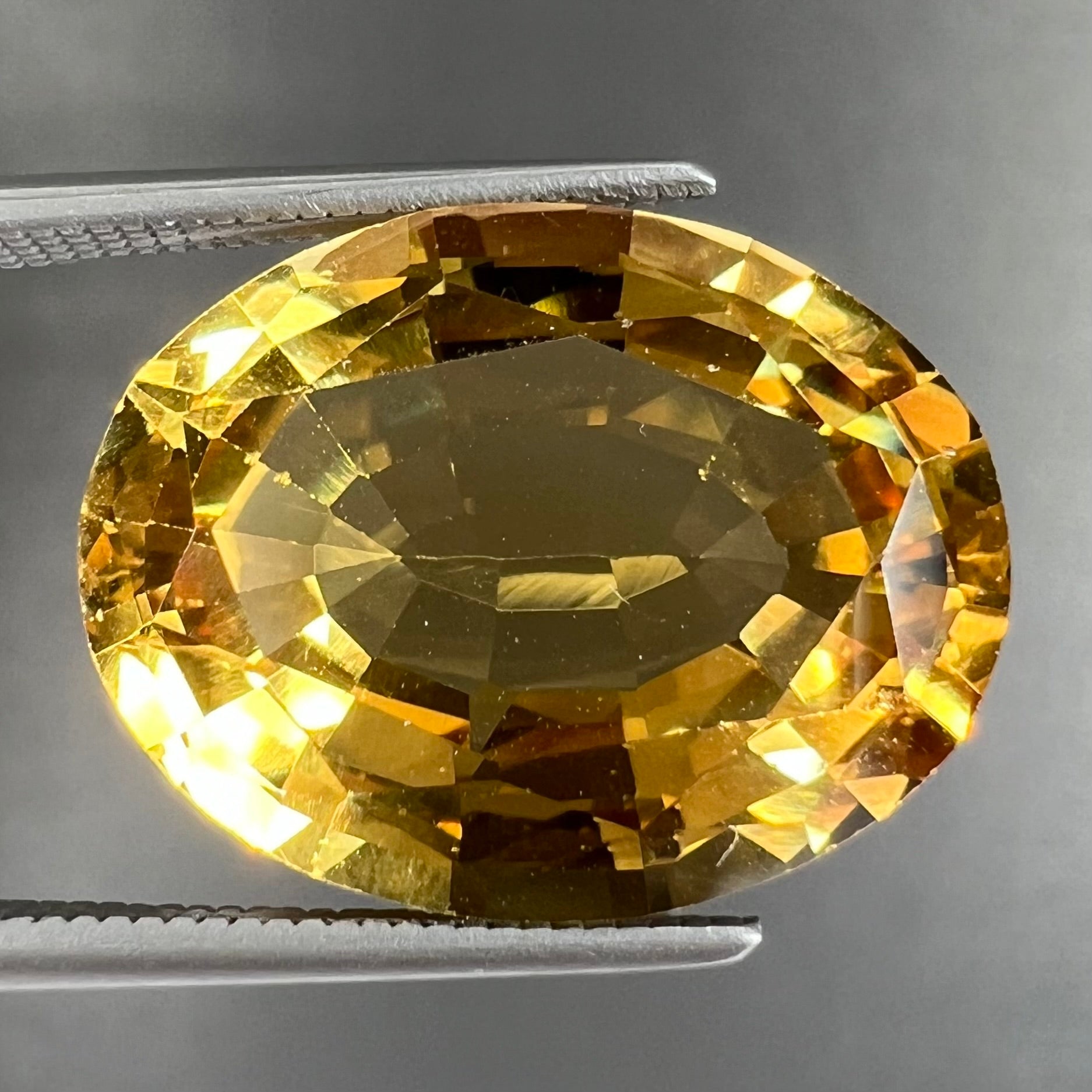 Loose 13.08ct Golden Beryl Stone, Oval Cut | Burton's Loose 13.08ct Golden Beryl Stone, Oval Cut | Burton's