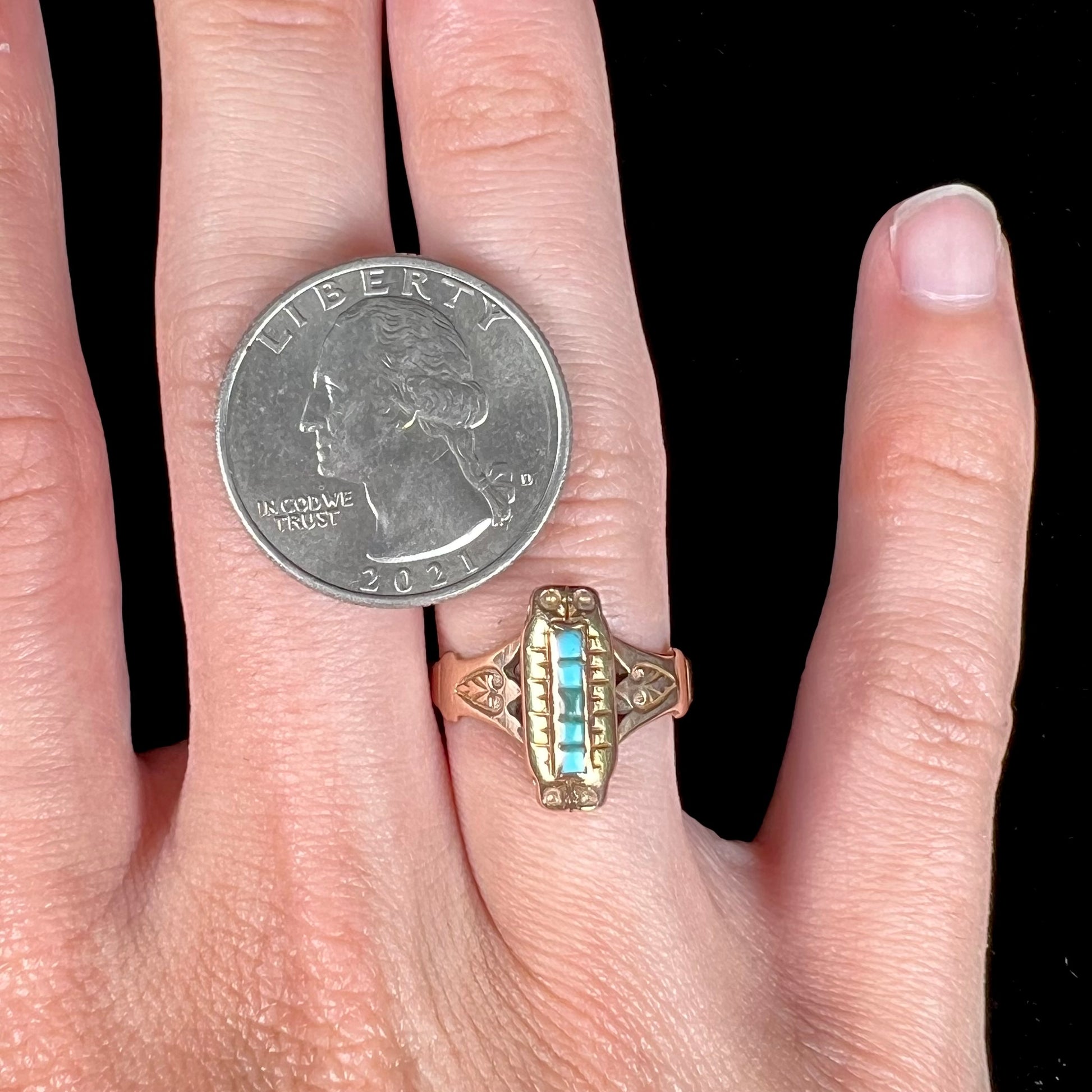 Antique yellow gold ring set with five square turquoise stones, circa 1920's.