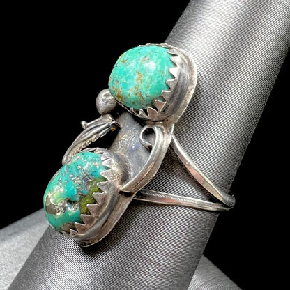 A ladies' sterling silver and green Morenci turquoise ring.  The ring is handmade in the Navajo style.