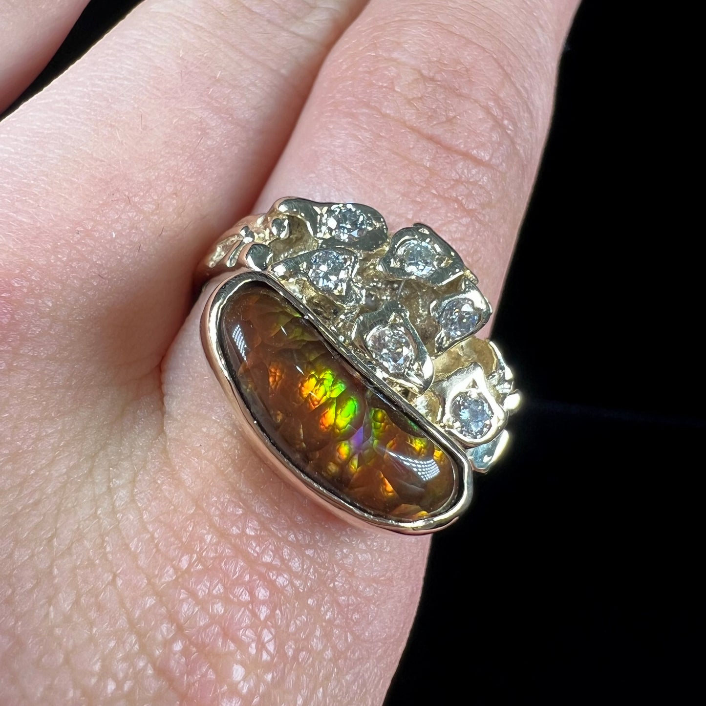 A ladies' nugget style yellow gold Mexican fire agate and diamond ring.