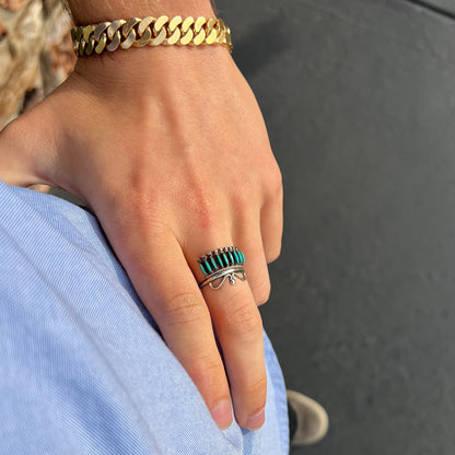 A ladies' Zuni Indian ring set with natural Sleeping Beauty needlepoint turquoise stones.