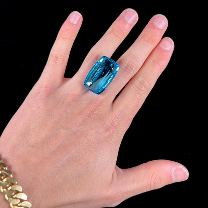 A large, loose Swiss blue topaz gemstone.