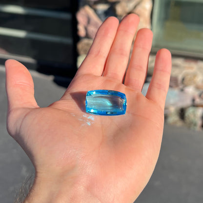 A large, loose Swiss blue topaz gemstone.