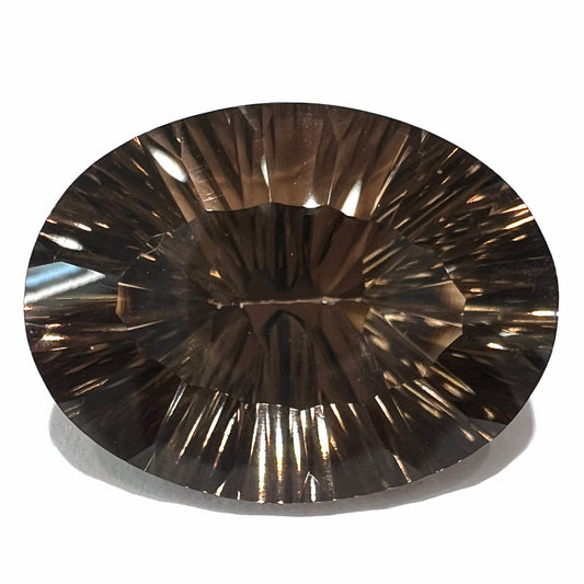 A loose, faceted oval laser cut smoky quartz gemstone.