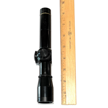 A 2x zoom pistol scope manufactured by Leupold.