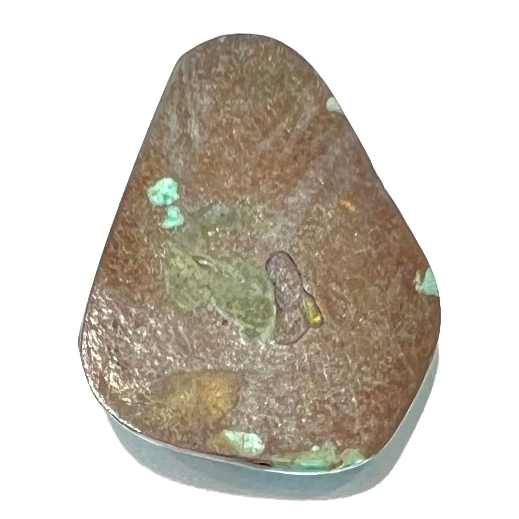 A loose, triangular drop shape Dry Creek turquoise stone.