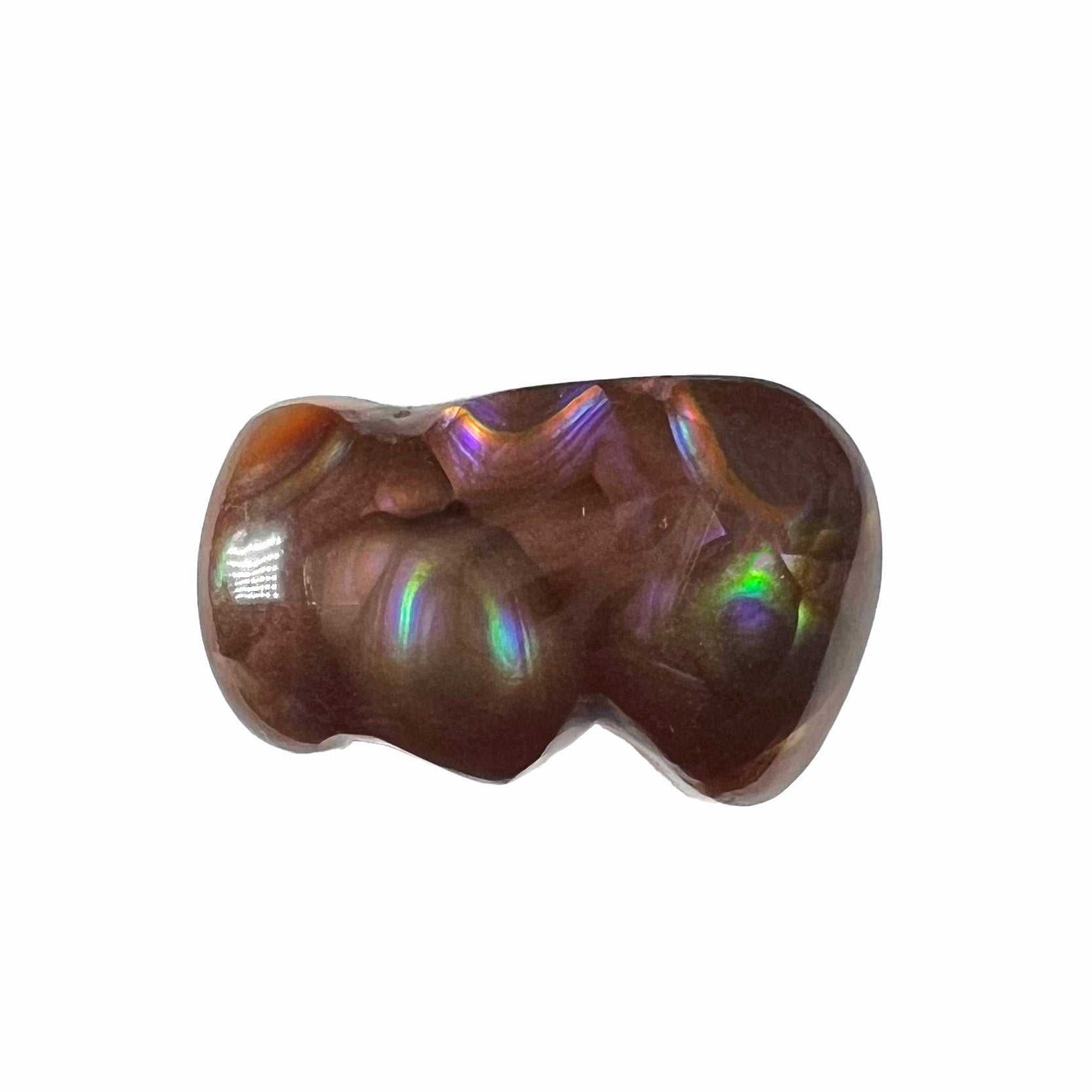 A polished, freeform shaped fire agate stone.  The stone is purple, green, and blue with red and yellow banding.