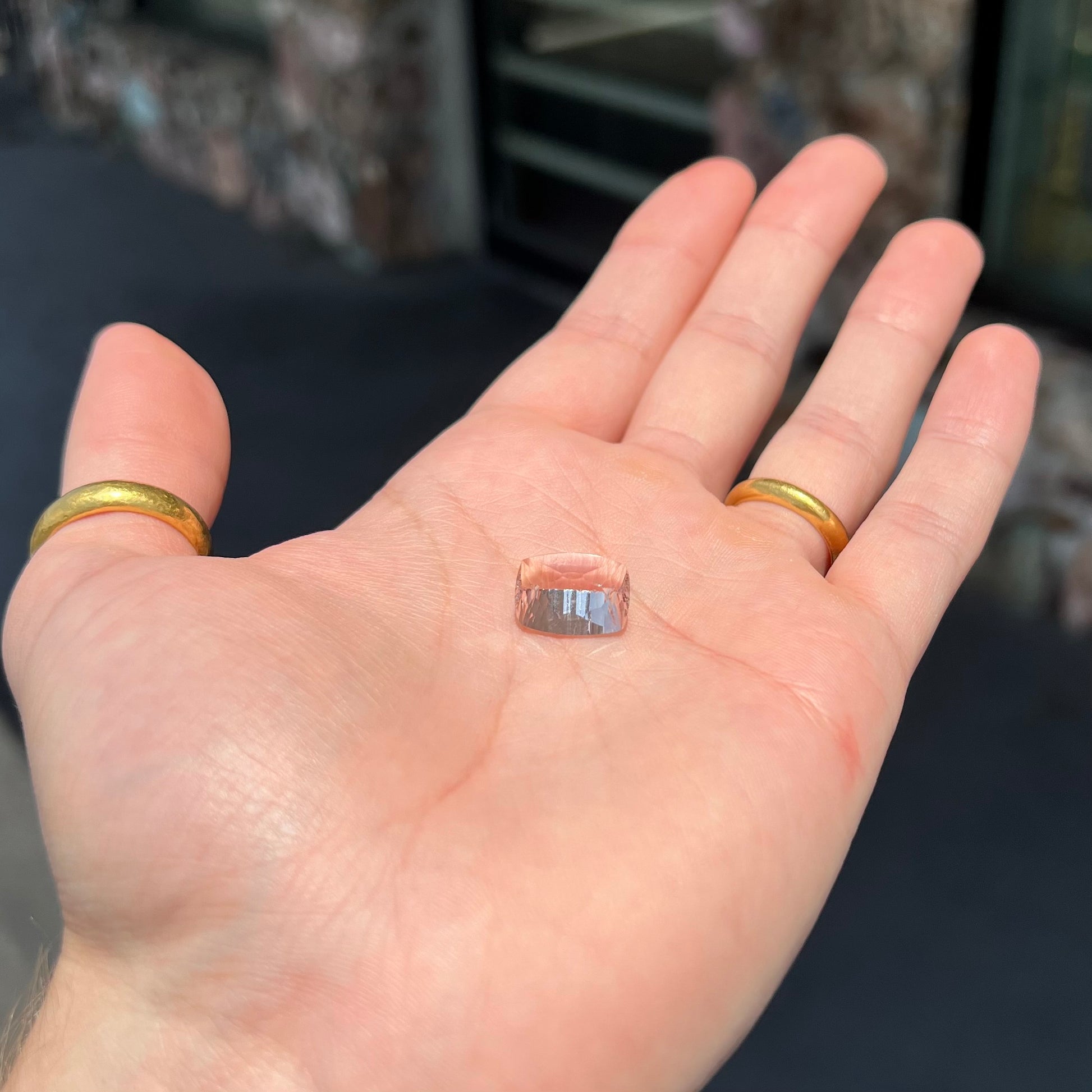 A loose, modified cushion cut pink morganite stone.