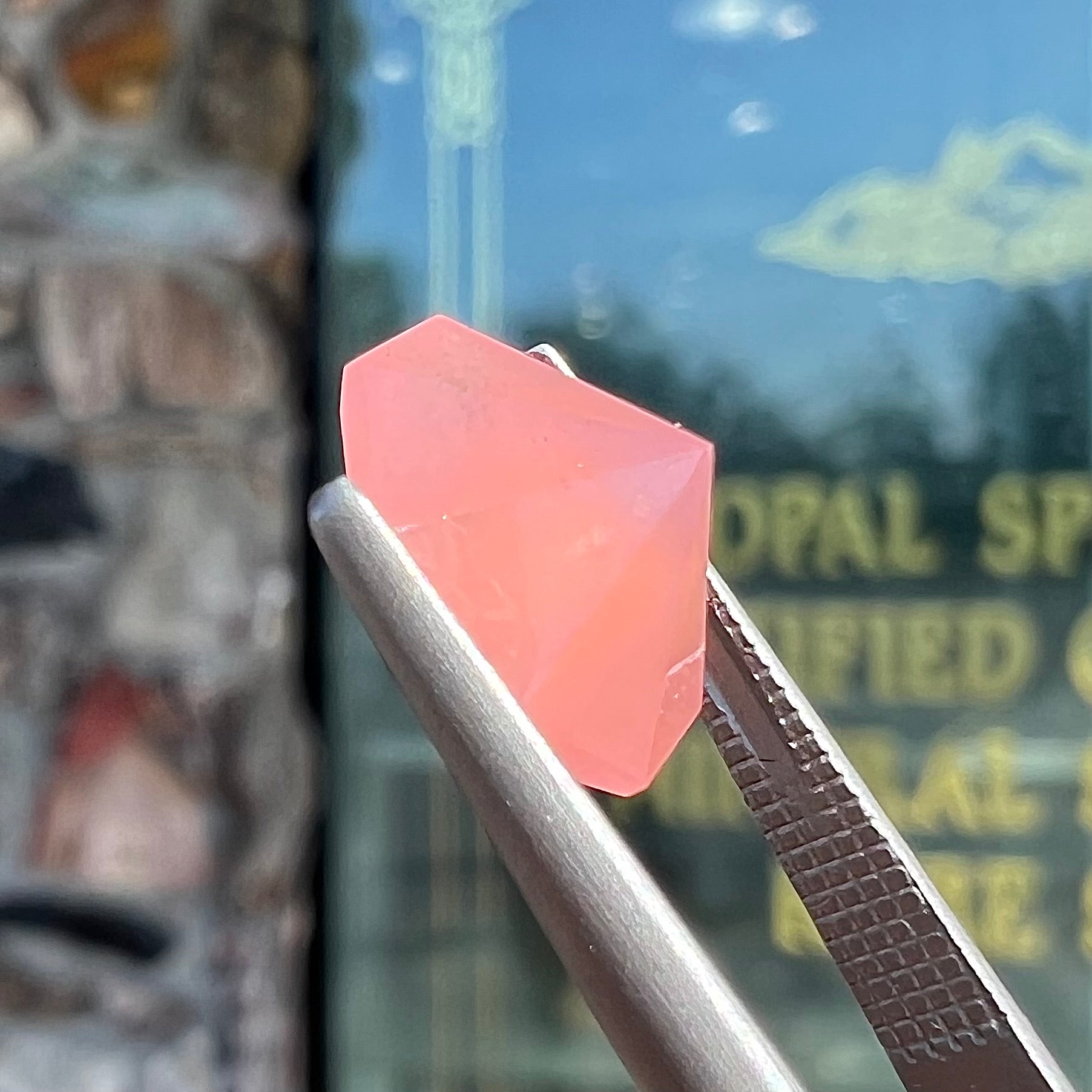 A faceted, octagon cut pink fire opal from Mexico.