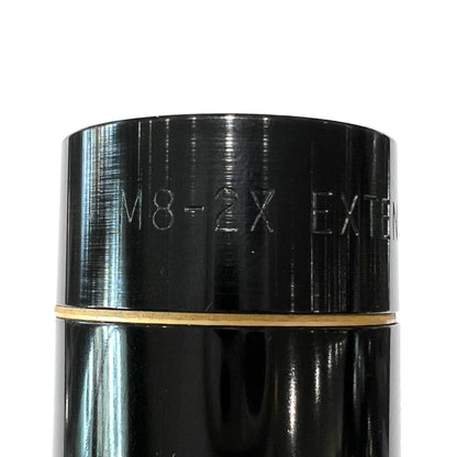A 2x zoom pistol scope manufactured by Leupold.