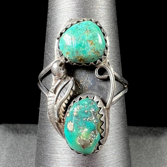 A ladies' sterling silver and green Morenci turquoise ring.  The ring is handmade in the Navajo style.