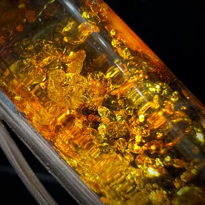 A piece of yellow sun-spangled amber.