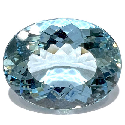 A loose, AAA grade, oval cut aquamarine stone from Brazil.