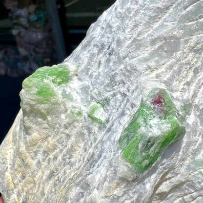 Green pargasite crystals in white calcite matrix from Luc Yen District, Vietnam.