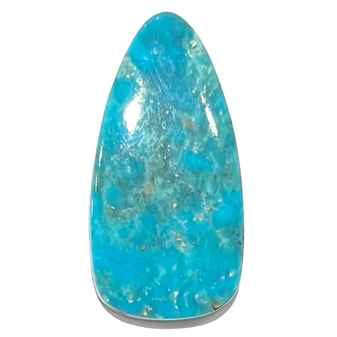 A loose, pear shaped Morenci turquoise cabochon.  The stone has pyrite inclusions.
