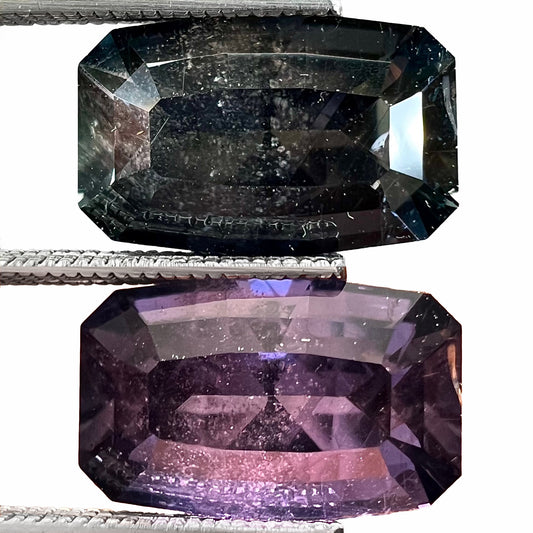 A loose, modified emerald cut, natural color change sapphire stone.  The stone shifts from black to blue to purple to green.