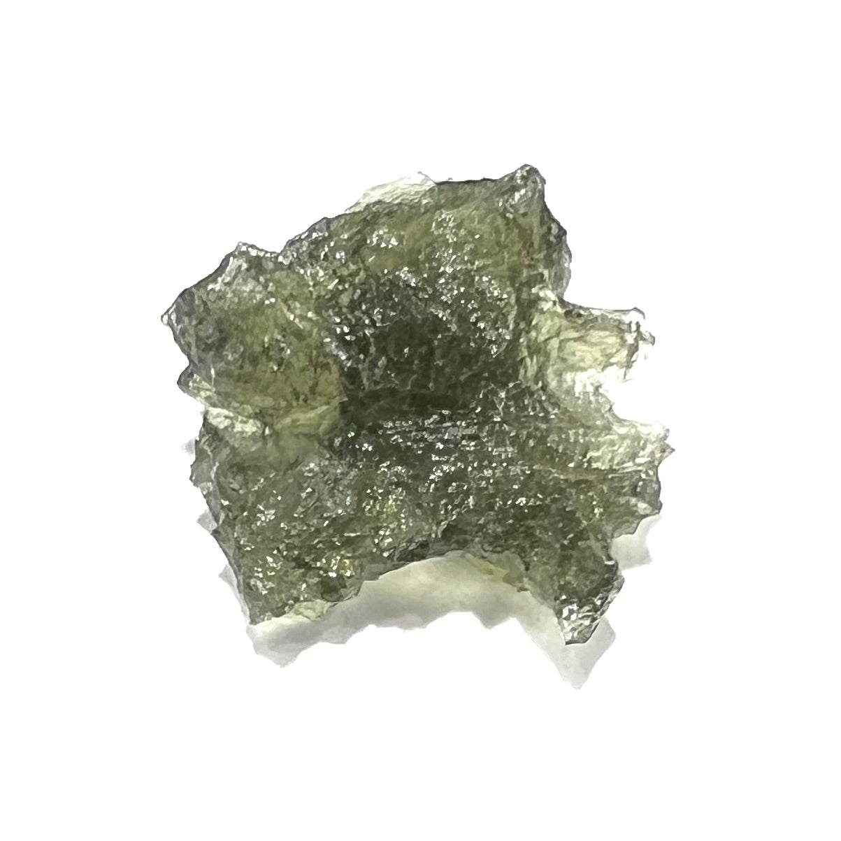 A natural, rough moldavite crystal.  The stone is green color and transluscent.