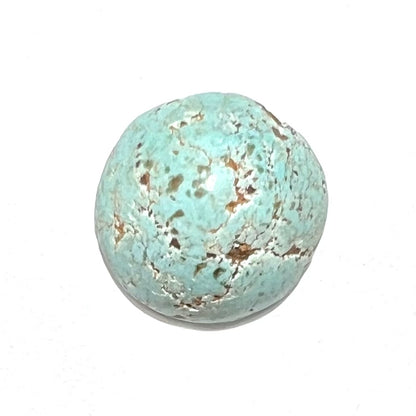A round cabochon cut Sleeping Beauty turquoise stone from Arizona.
