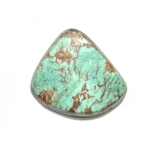 A loose greenish blue Royston turquoise stone from Nevada.  The stone has brown matrix.