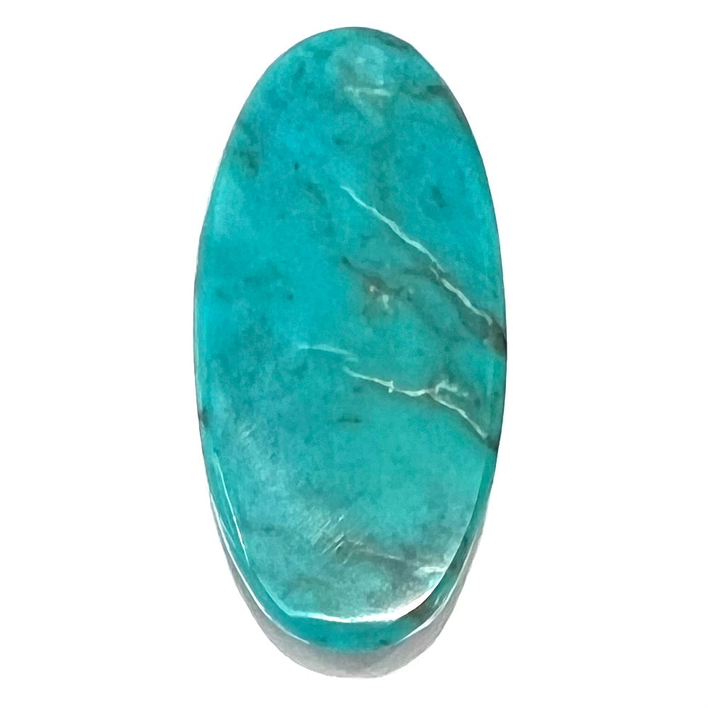 A loose, oval cabochon cut turquoise stone from Royston District, Nevada.
