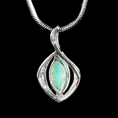 A ladies' marquise cabochon cut natural white crystal opal necklace in sterling silver.