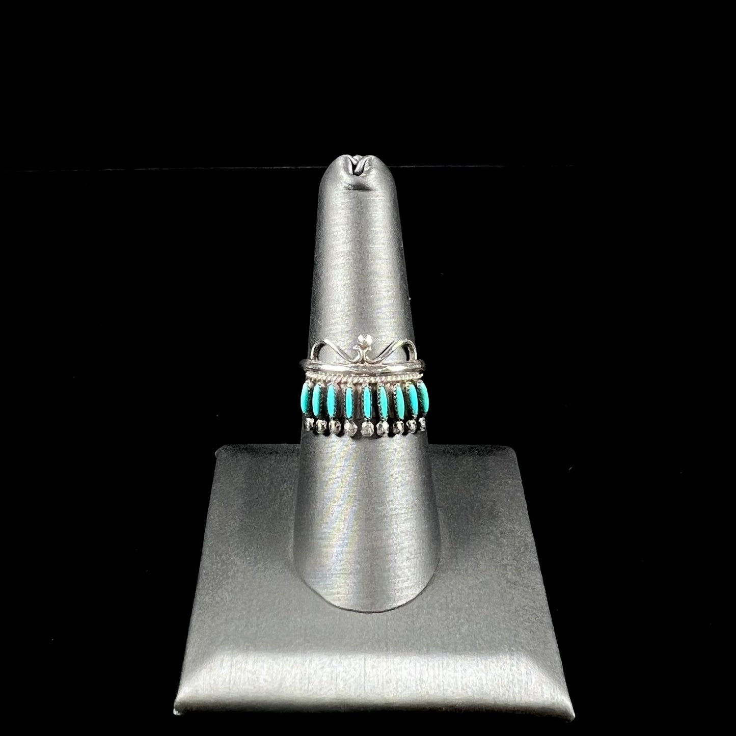 A ladies' Zuni Indian ring set with natural Sleeping Beauty needlepoint turquoise stones.