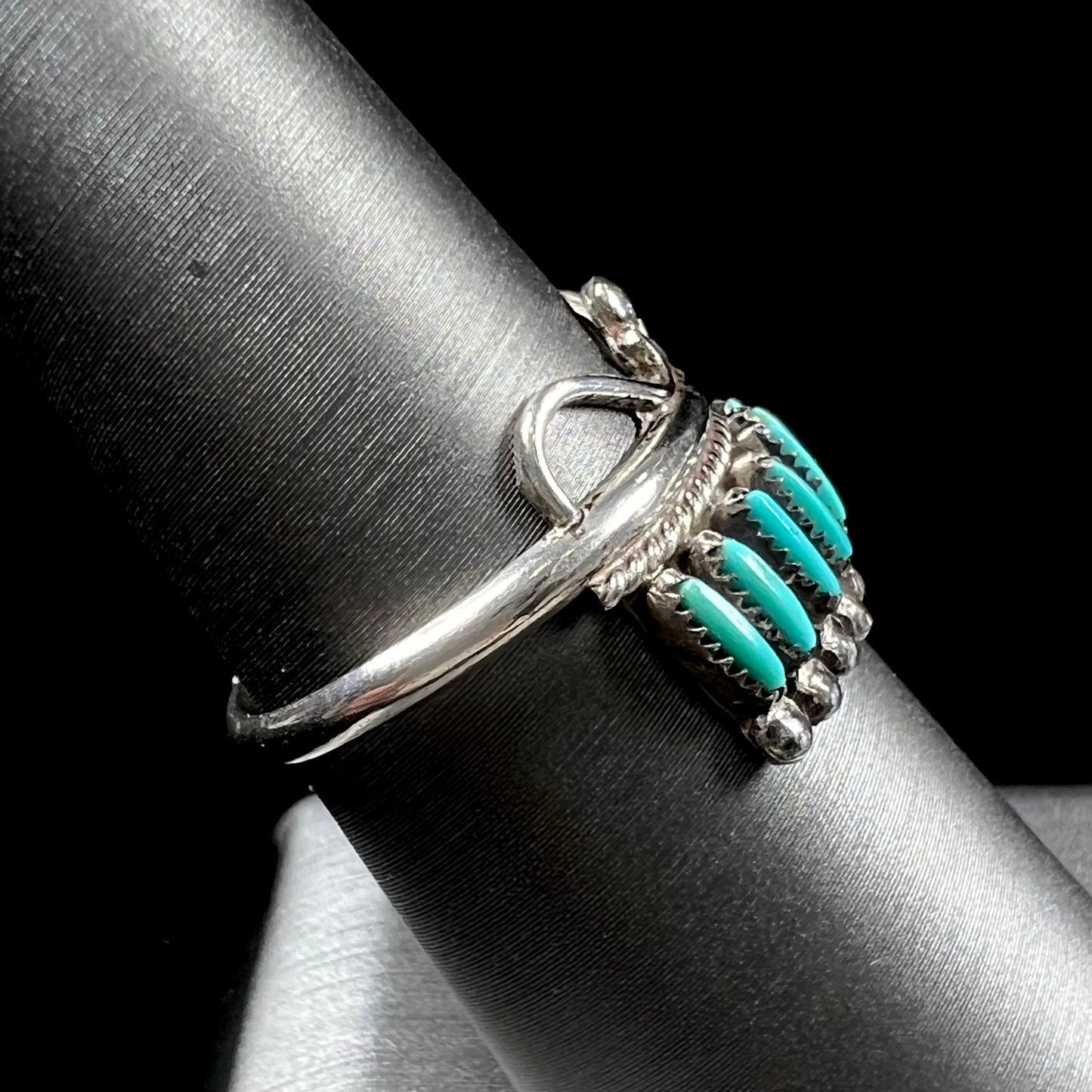 A ladies' Zuni Indian ring set with natural Sleeping Beauty needlepoint turquoise stones.