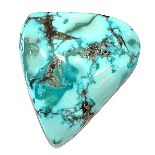 A loose, freeform triangular cabochon cut turquoise stone from Sonora, Mexico.
