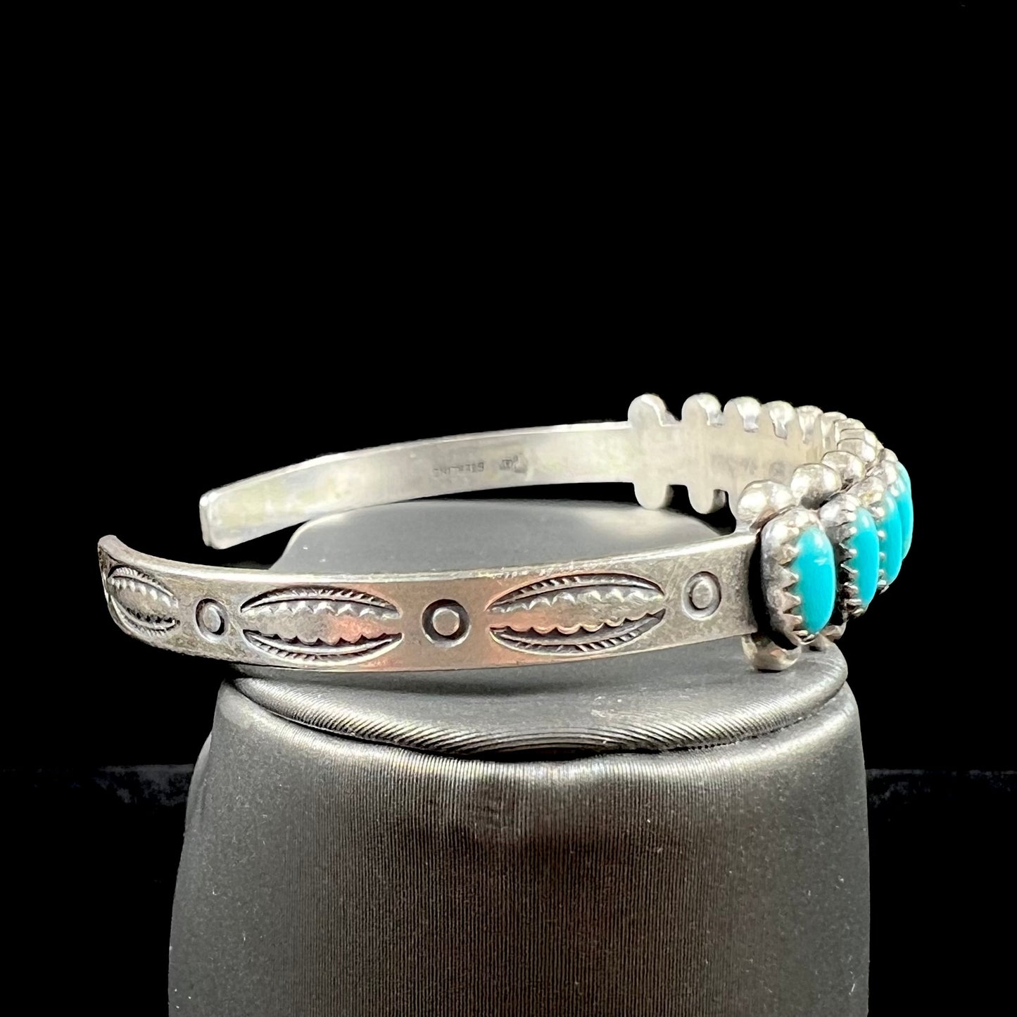 A ladies' sterling silver Zuni Indian turquoise cuff bracelet.  The stones are oval cut Sleeping Beauty turquoise.