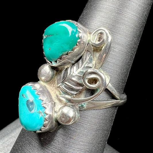 A ladies' Southwest style sterling silver ring set with Sleeping Beauty & Royston turquoise stones.