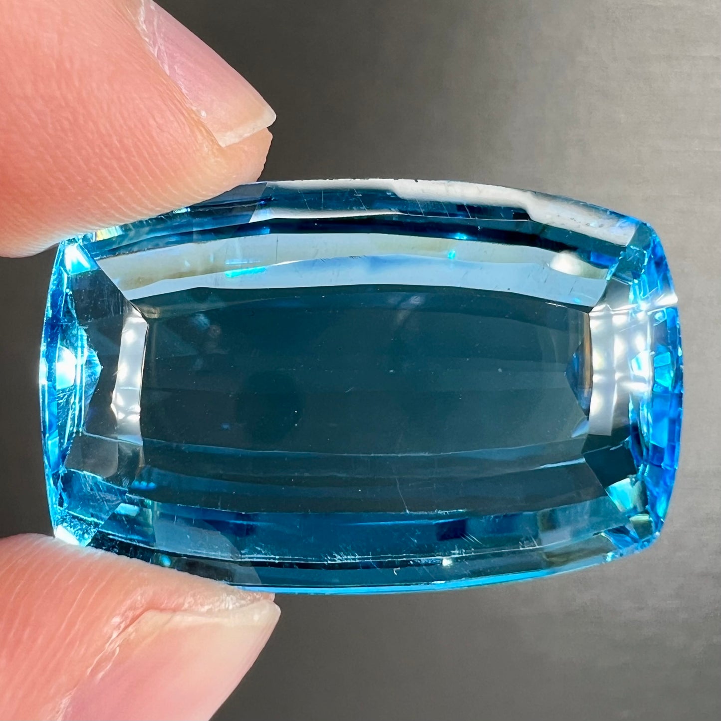 A large, loose Swiss blue topaz gemstone.