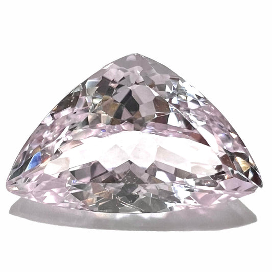 A loose, modified trillion cut kunzite gemstone.  The stone weighs 14.81 carats.