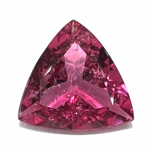 A trillion cut pink tourmaline gemstone.