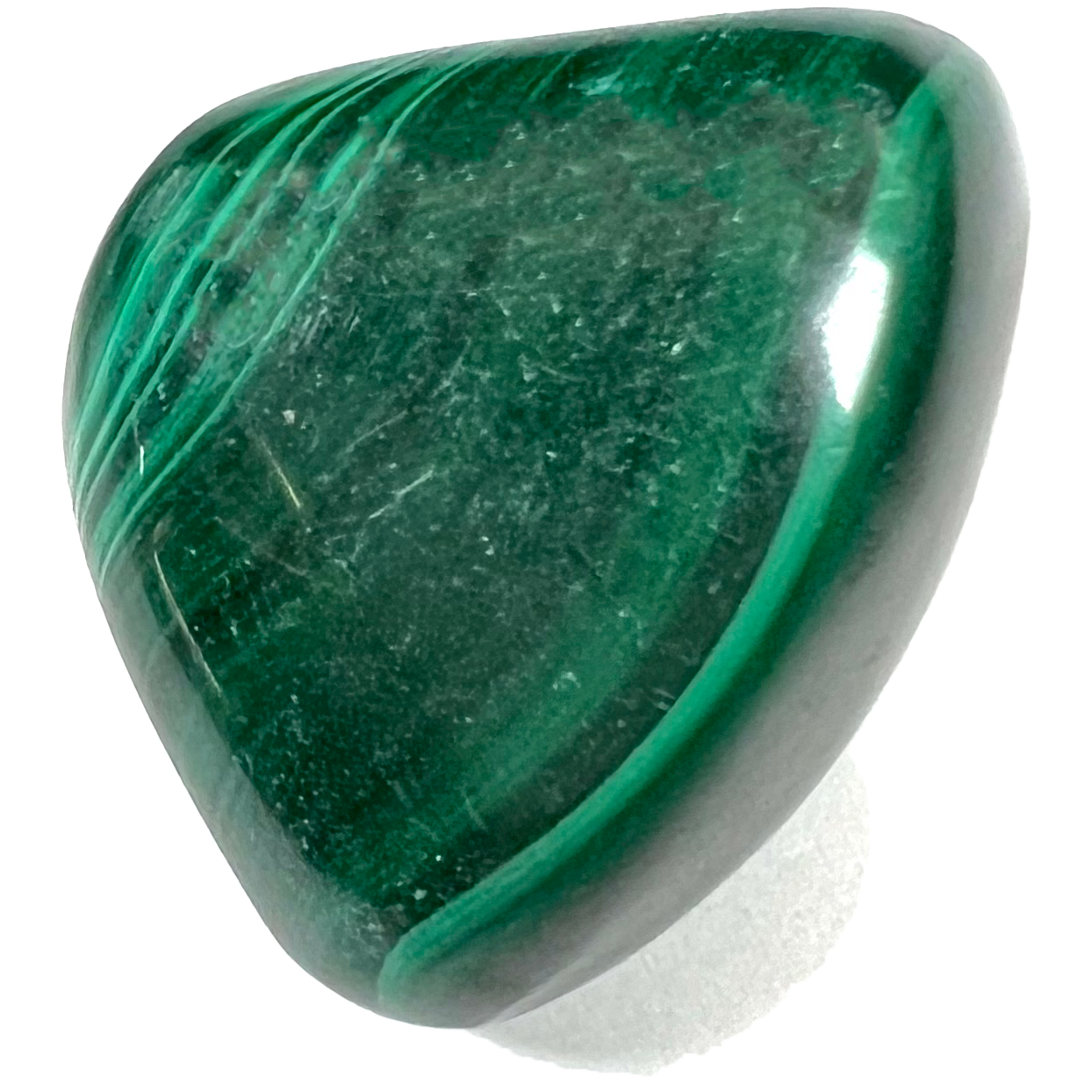 A tumble polished green striped malachite stone.