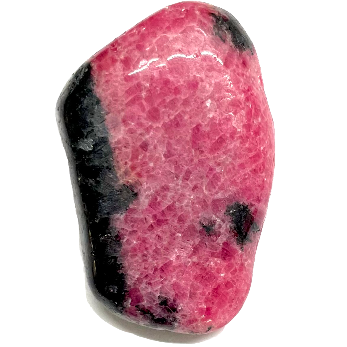 A tumbled rhodonite stone from Pakistan.  The rock is hot pink with black matrix.