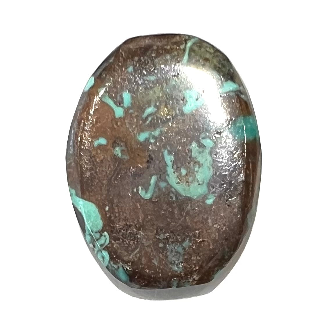 A loose, barrel cabochon cut turquoise stone from Royston District, Nevada.  The stone is greenish blue with brown and black matrix.