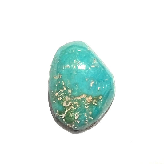 A loose, freeform cut Pilot Mountain turquoise cabochon.  The stone is greenish blue.