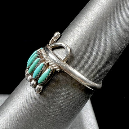 A ladies' Zuni Indian ring set with natural Sleeping Beauty needlepoint turquoise stones.