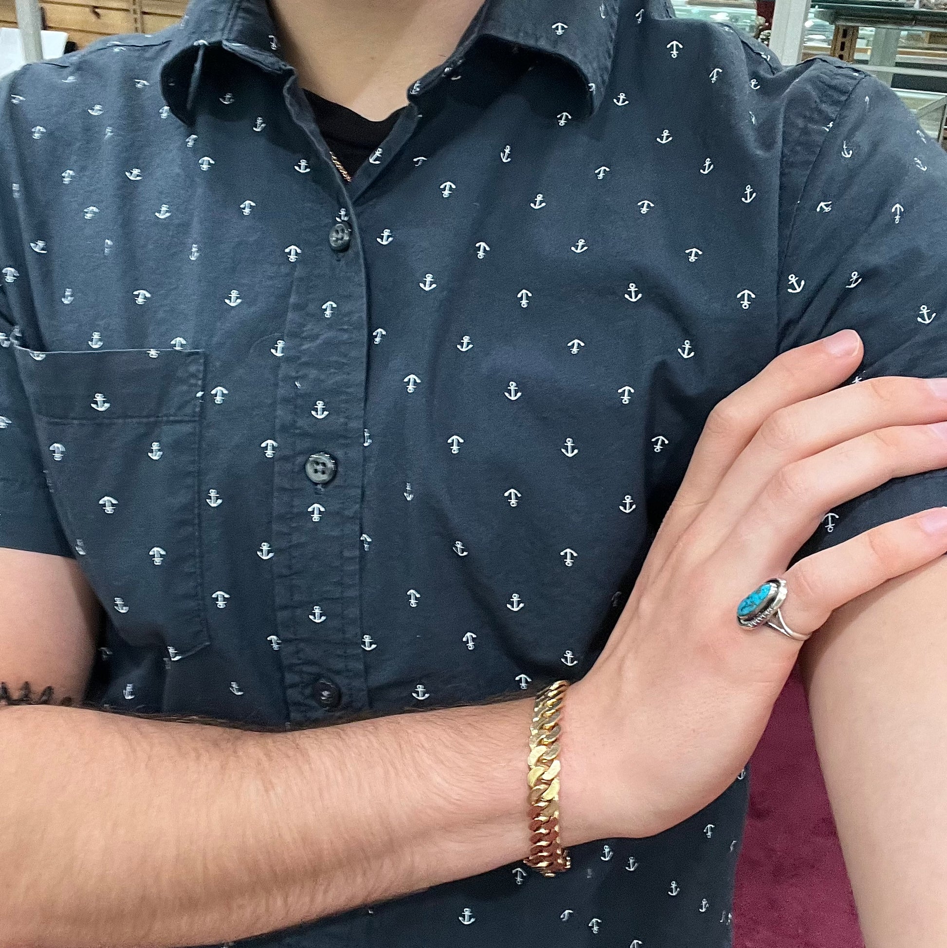A handmade sterling silver Navajo style ring set with a Morenci turquoise stone.