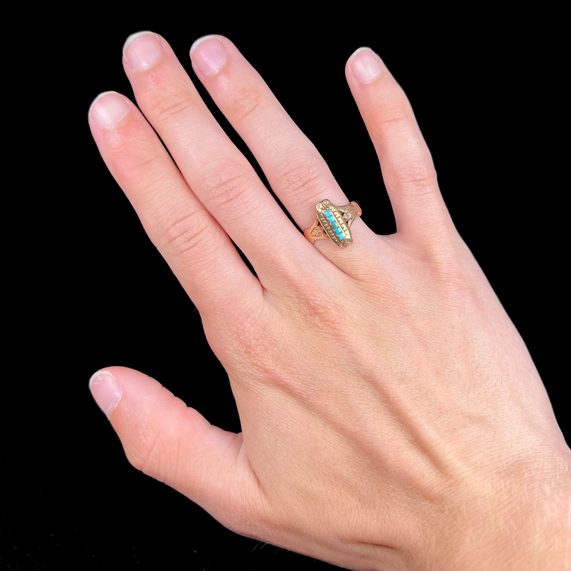 Antique yellow gold ring set with five square turquoise stones, circa 1920's.