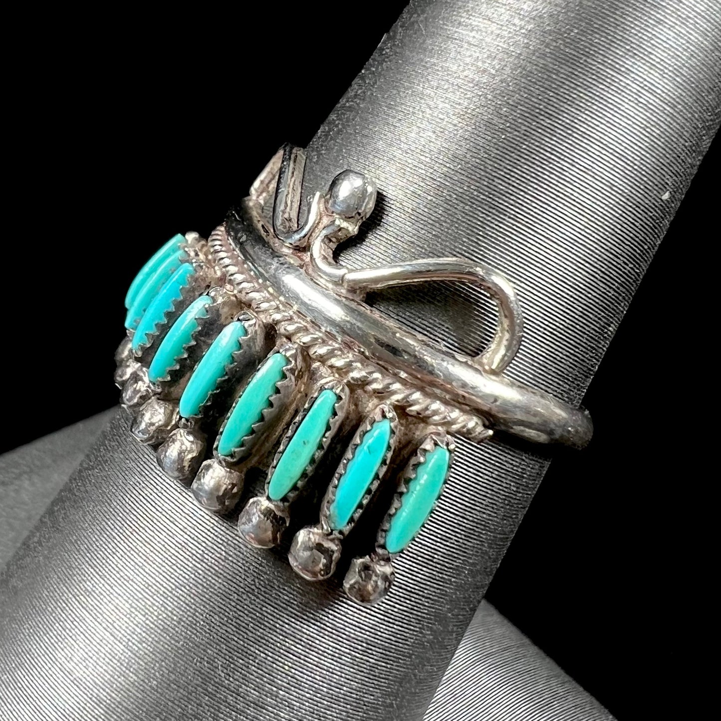 A ladies' Zuni Indian ring set with natural Sleeping Beauty needlepoint turquoise stones.