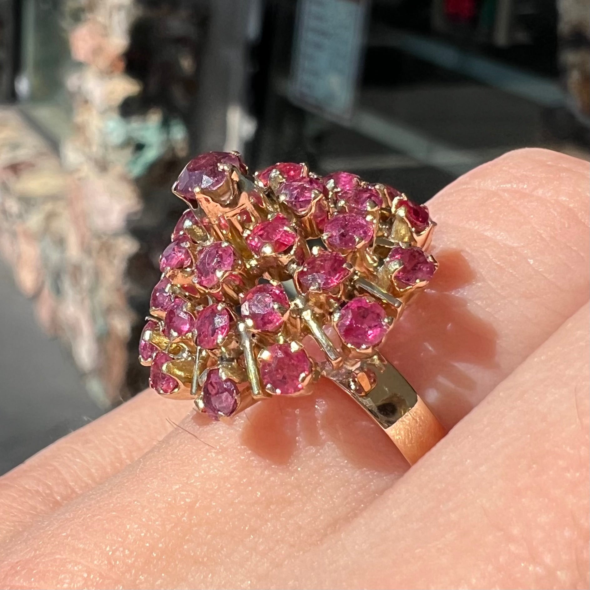 A ladies' vintage Thai princess ring set with round cut purplish red rubies.