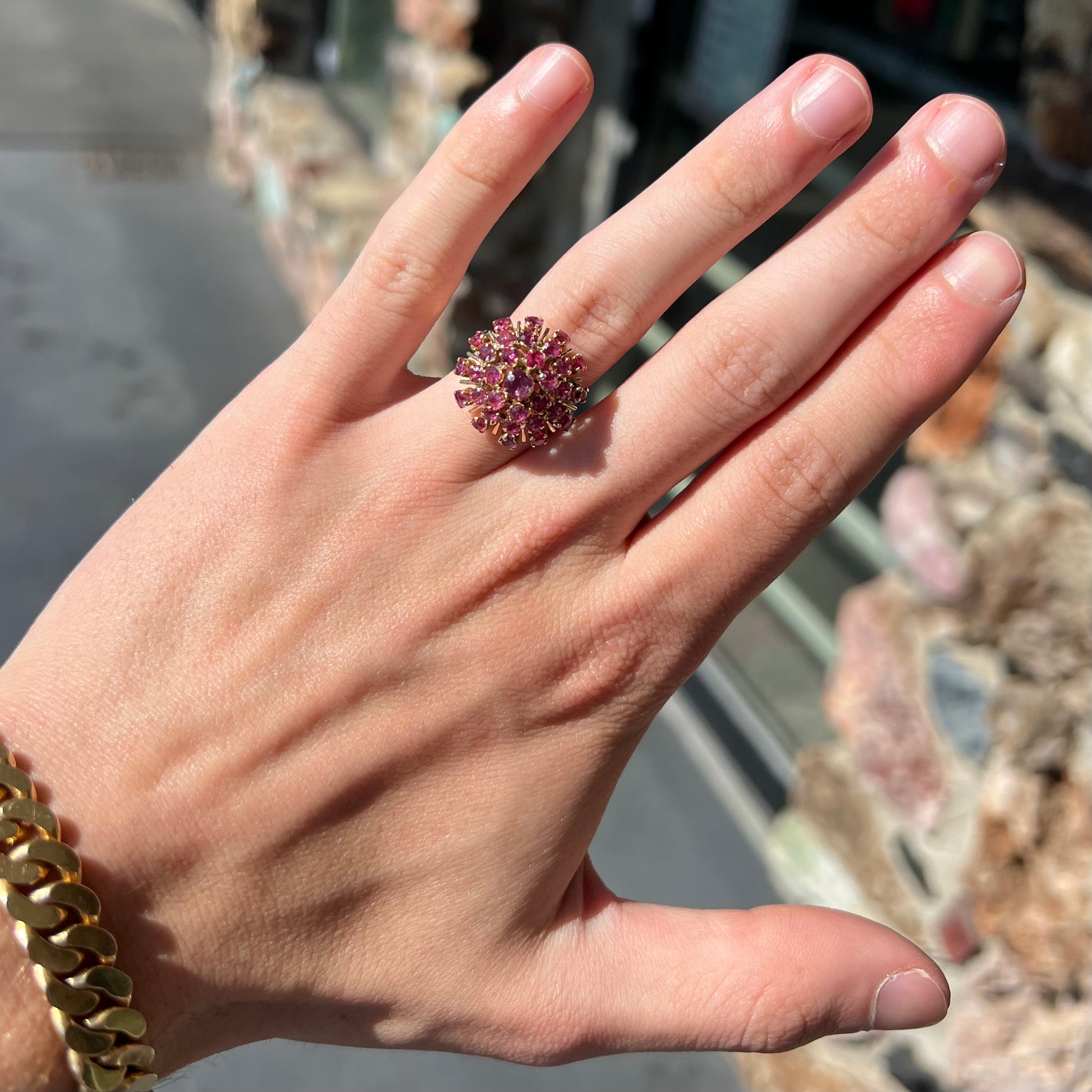 A ladies' vintage Thai princess ring set with round cut purplish red rubies.