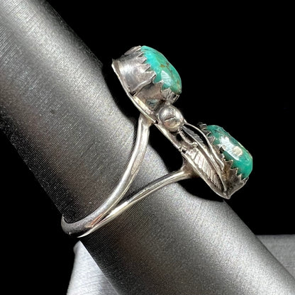 A ladies' sterling silver and green Morenci turquoise ring.  The ring is handmade in the Navajo style.