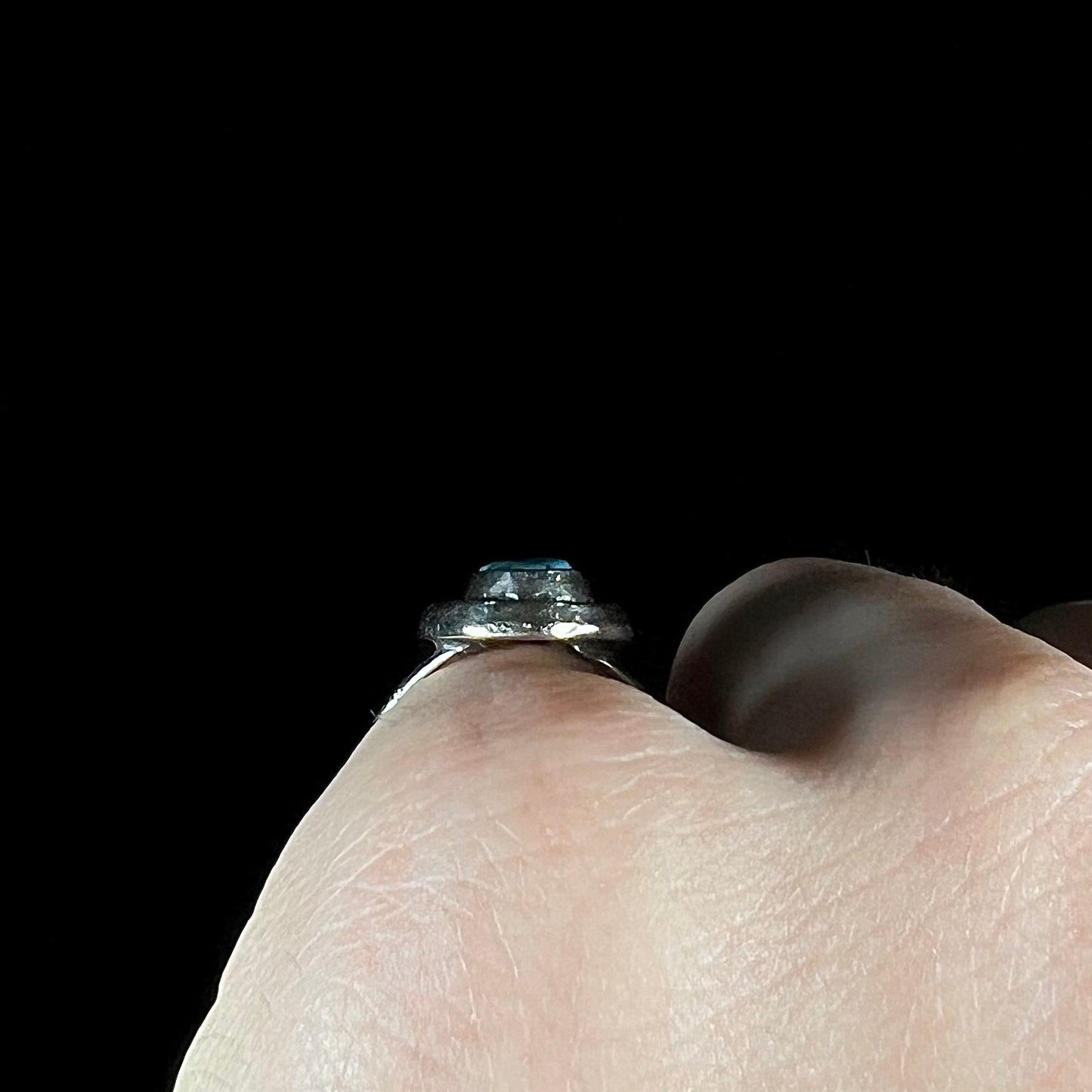 A handmade sterling silver Navajo style ring set with a Morenci turquoise stone.