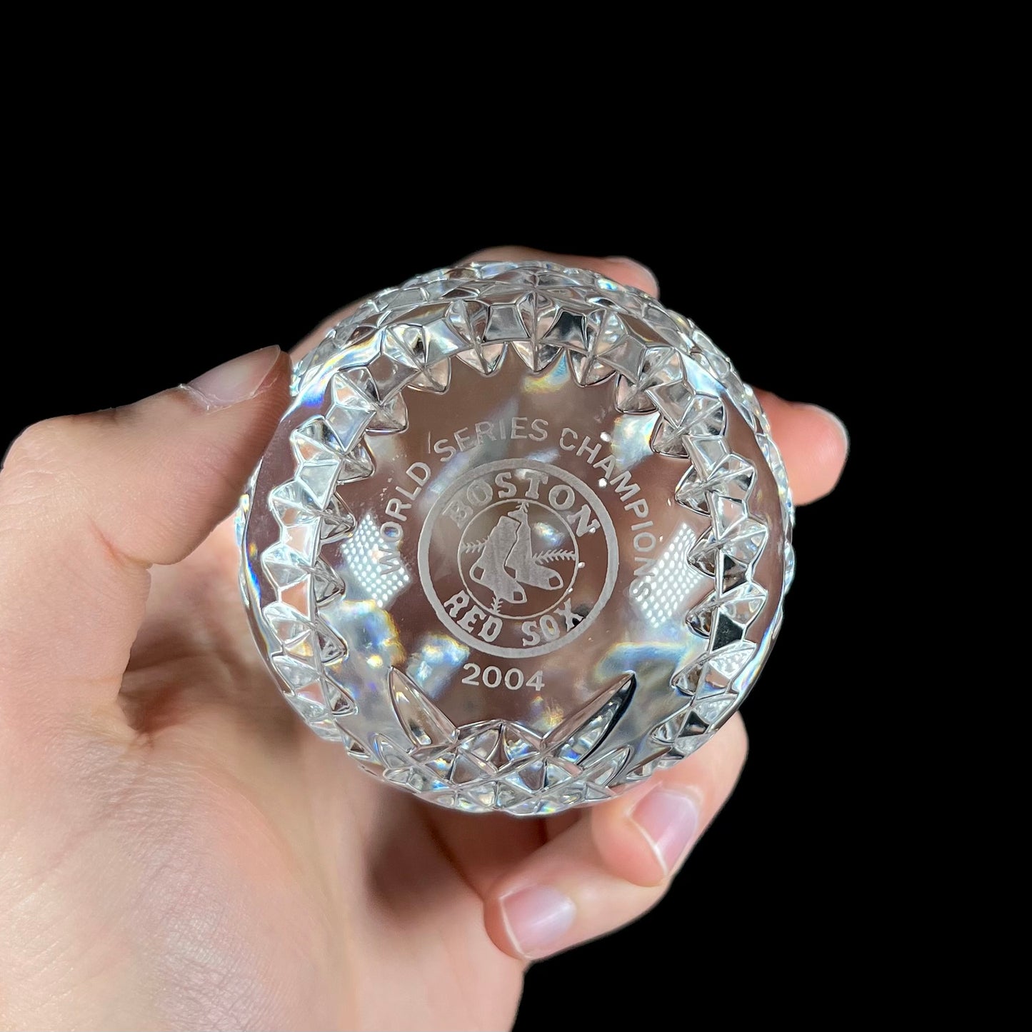 A baseball made from Waterford Crystal commemorating the Boston Red Sox 2004 World Series Championship.
