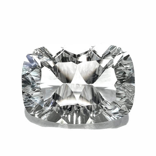 A loose, modified laser cushion cut white topaz gemstone.